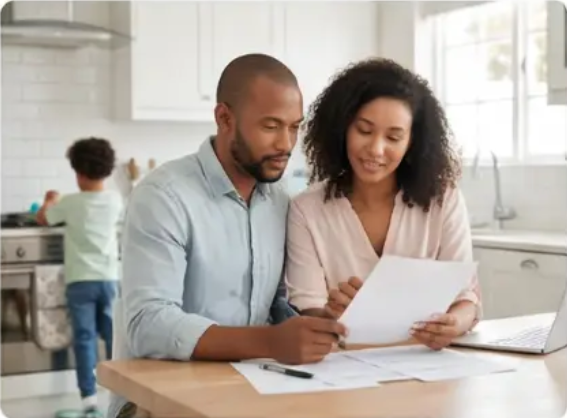 term_life_who_for Couple reviewing term life insurance options